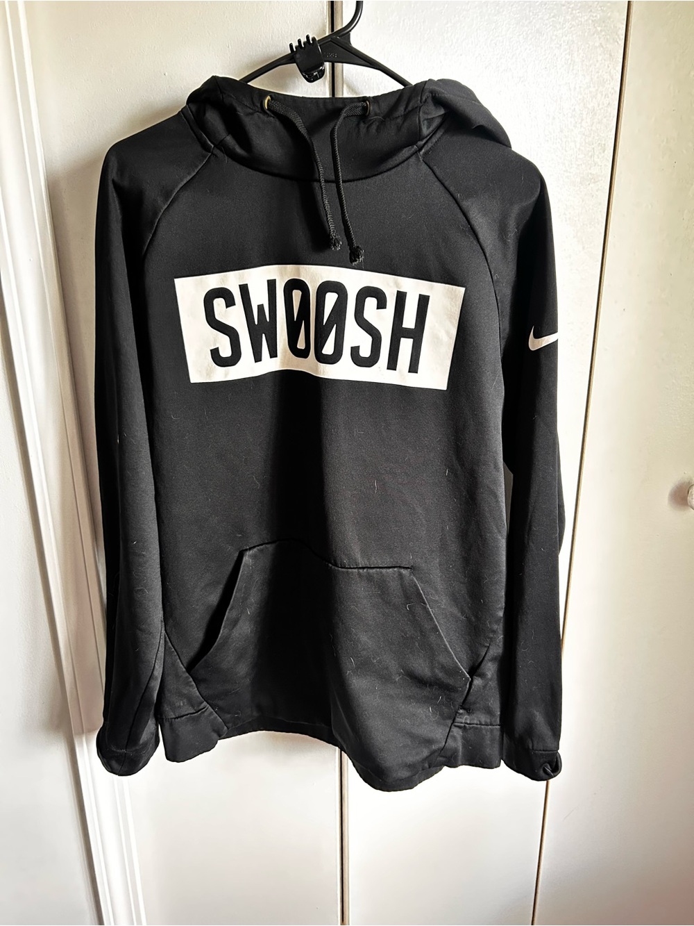 Nike Black Dri-FIT Hoodie with White Logo and Yellow Eyelets